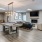 a living room with a tv and couches