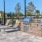 a brick patio with a brick wall and grills