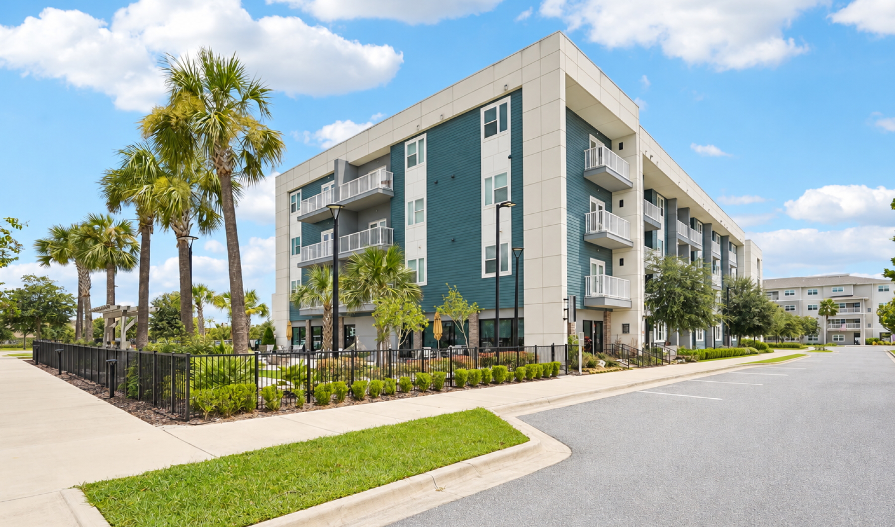Apartment building exterior with palm trees