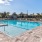 a swimming pool with a fence around it