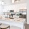 a kitchen with white cabinets