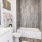 a bathroom with a tub toilet and sink